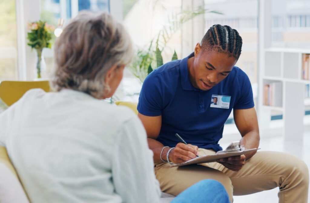 An assisted living nurse interviews a resident on their health.